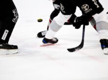 people playing ice hockey