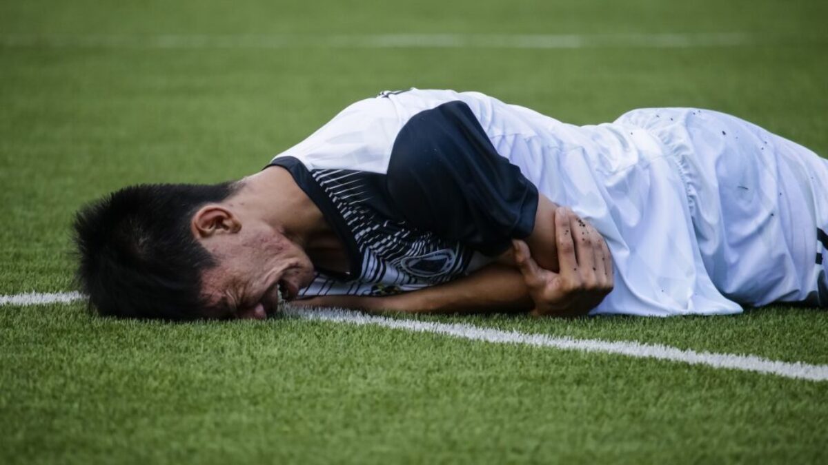 Man Crying on Field