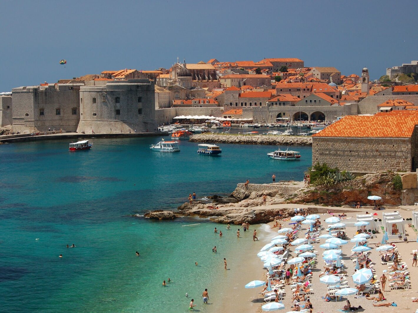 people near seashore during daytime