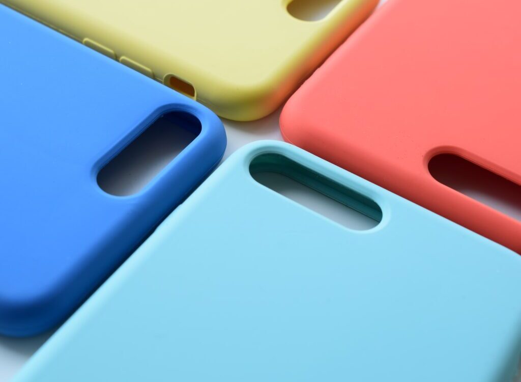 four assorted-color smartphone cases