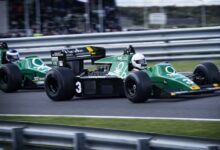 Man Riding on Racing Car