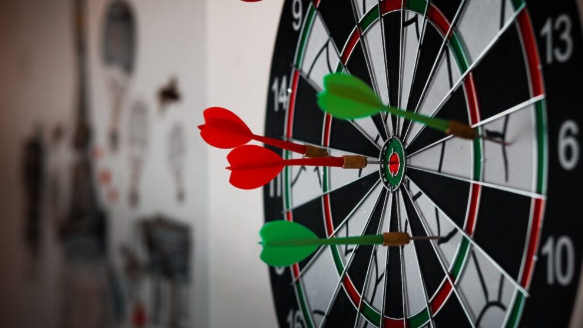 Close-Up Photo of Dart Pins on Dartboard