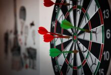 Close-Up Photo of Dart Pins on Dartboard