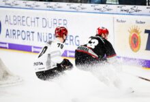 two hockey players in hockey stadium