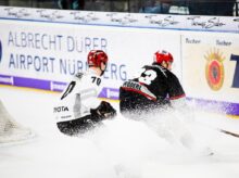 two hockey players in hockey stadium