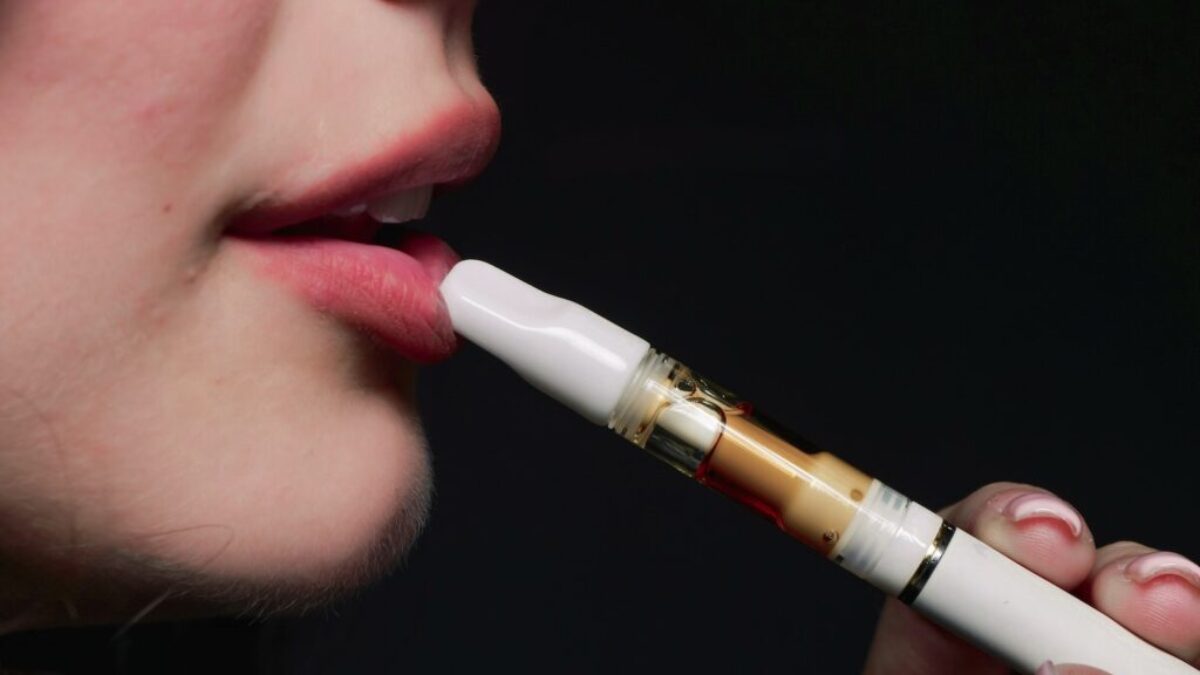A Person Smoking Electronic Cigarette