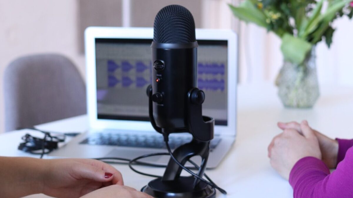 People in Front of Black Microphone