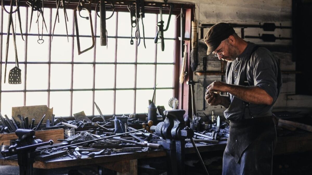 man inside tool shed