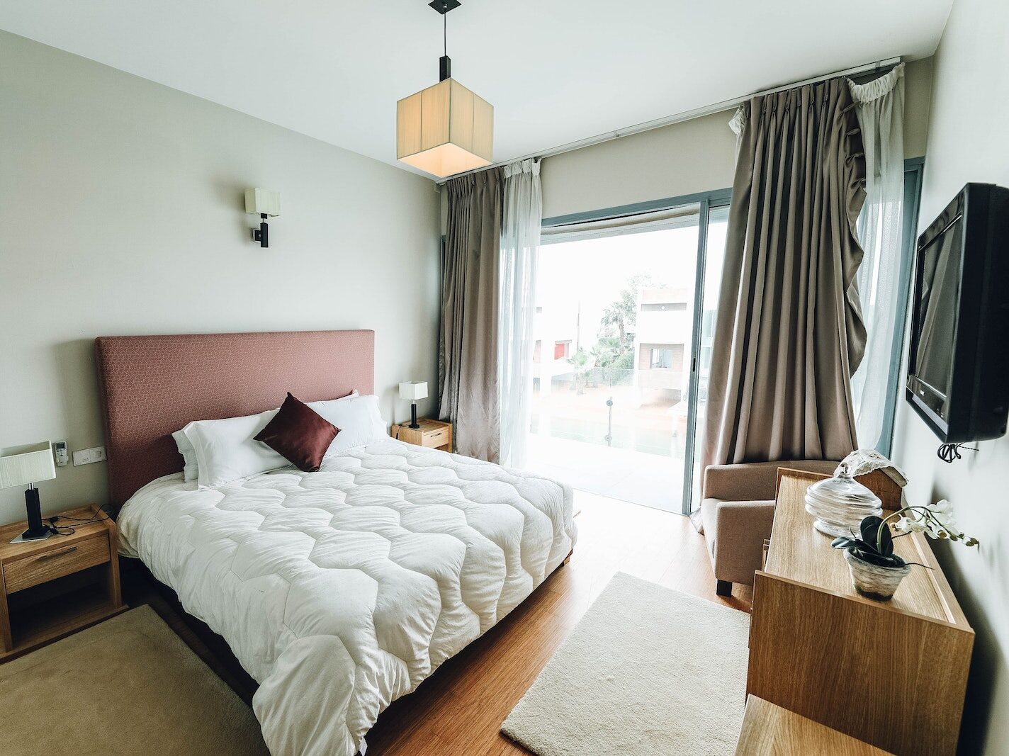 White Bed Near Window