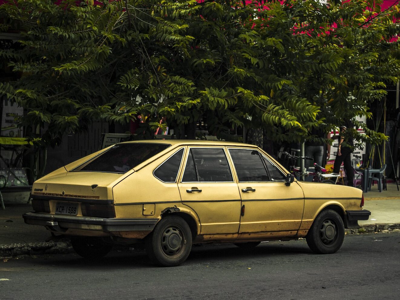 Yellow Sedan Parked