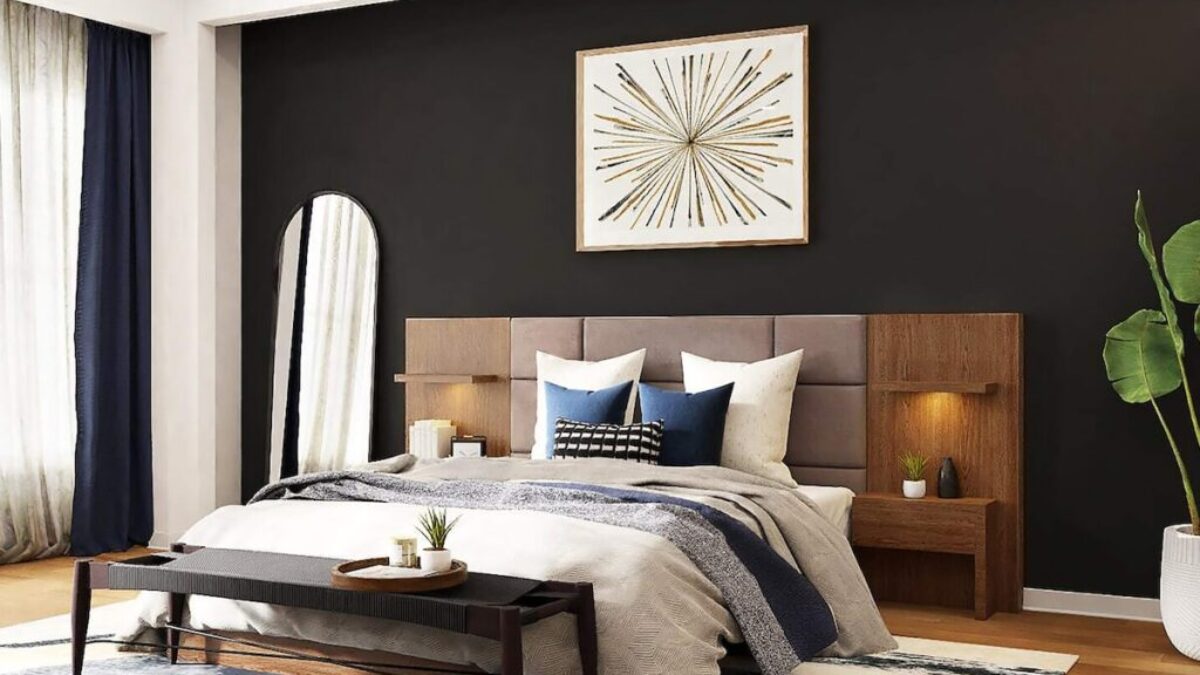 a bedroom with black walls and a white bed