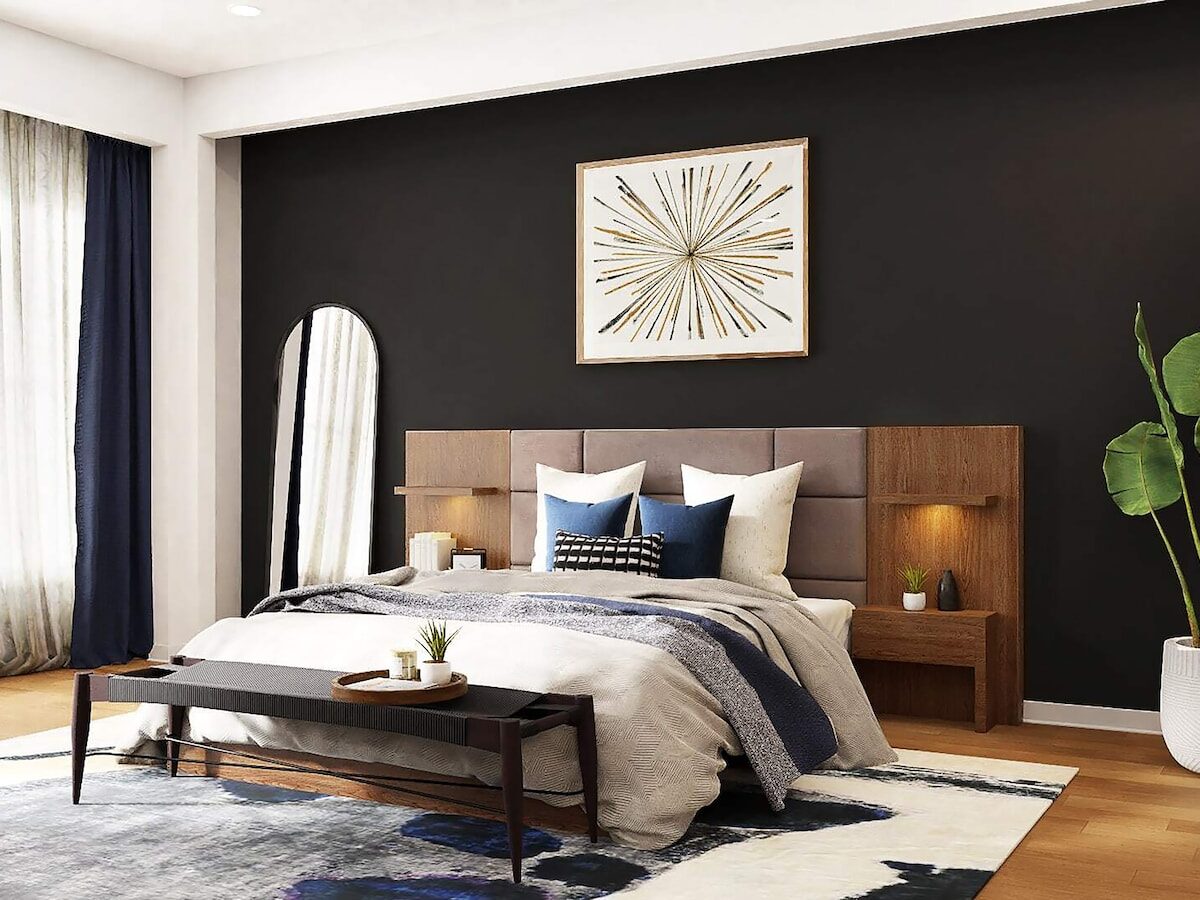 a bedroom with black walls and a white bed