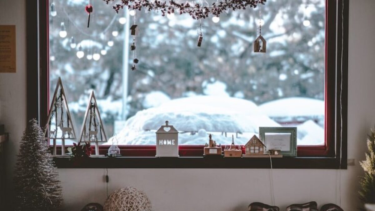 black flat screen tv turned on showing snow covered mountain