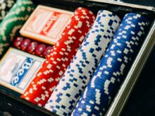closeup photography of poker chip set