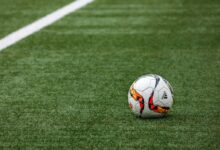 White Adidas Soccer Ball on Grass
