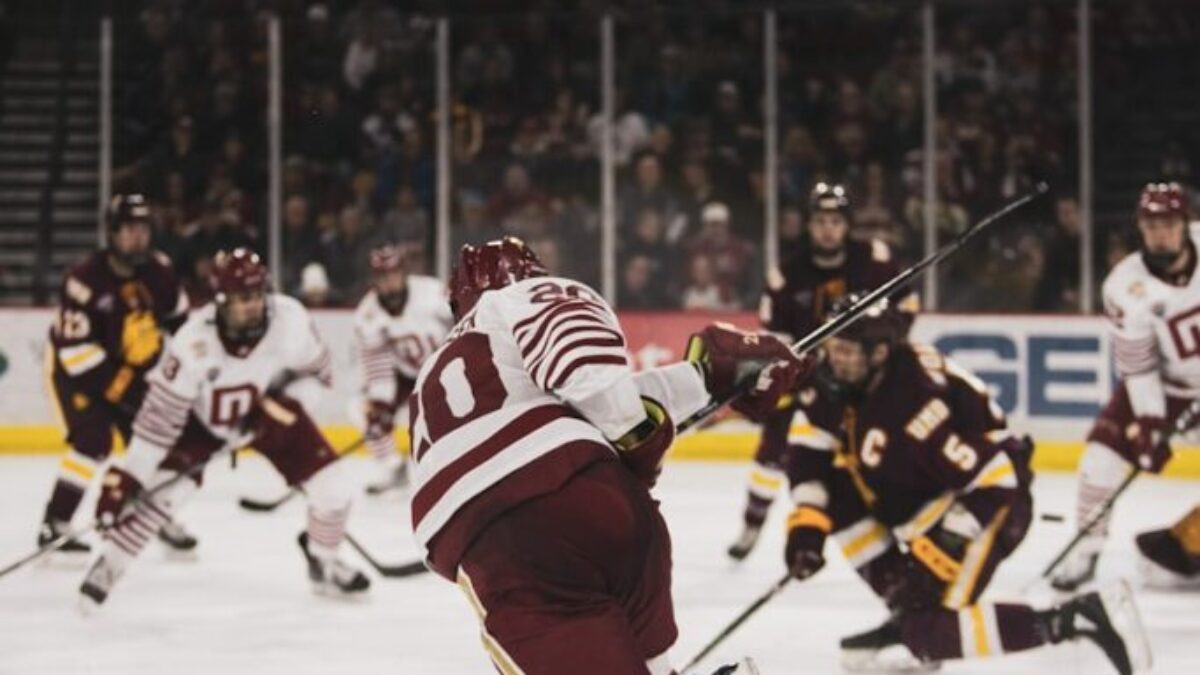 ice hockey players on ice hockey stadium