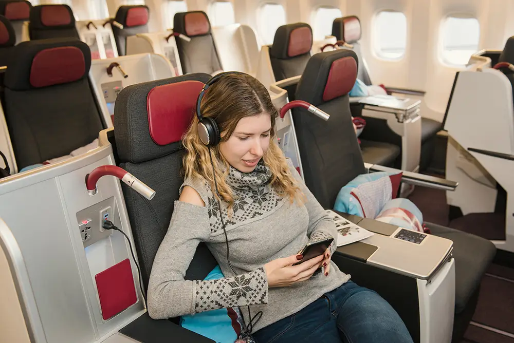 Někdy stačí málo, a místo letu v eceomy class si můžete užít pohodlí business class. - SportDeník žena v první třídě